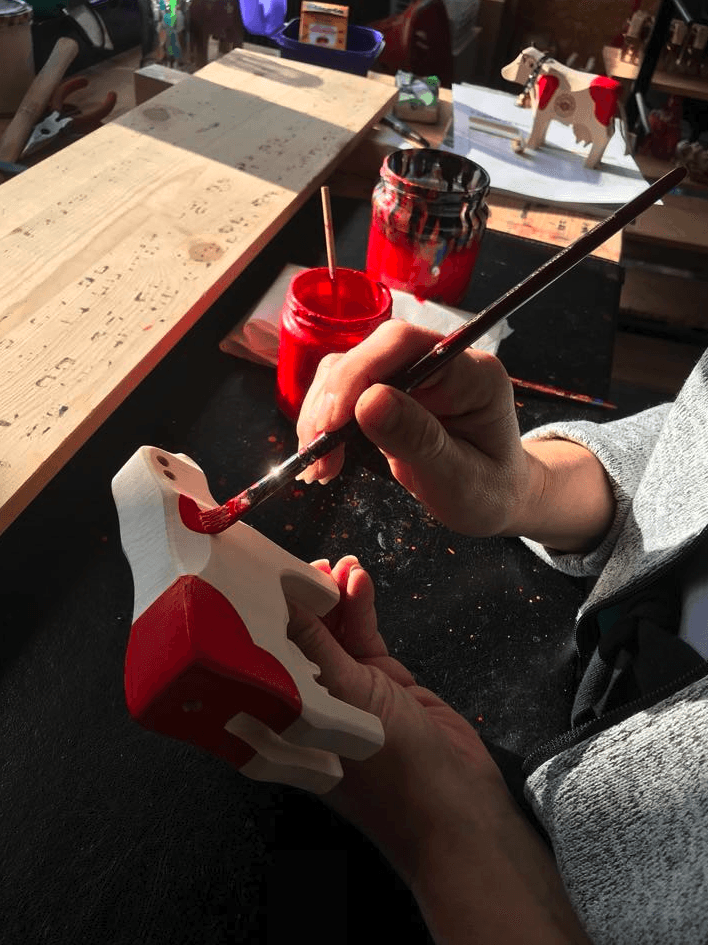 painting swiss wooden cow toy