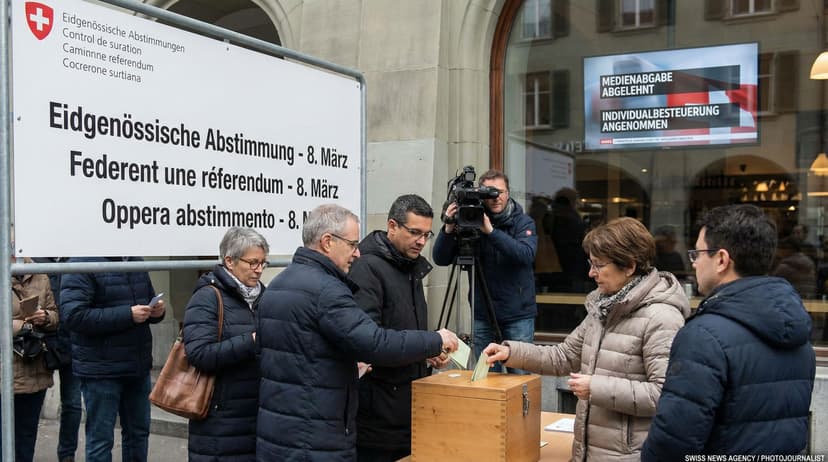 Swiss Voters Reject Media Fee Cut, Back Individual Taxation in National Vote